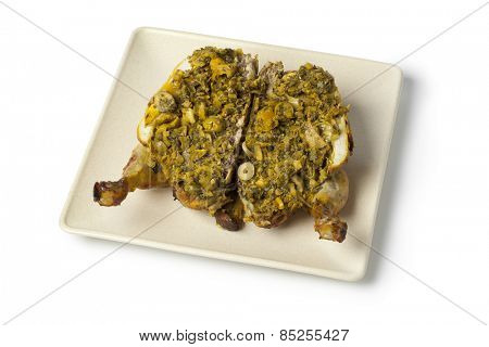  Traditional moroccan stuffed chicken on white background