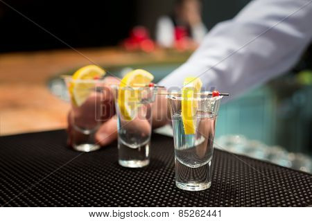 Three Tequila Shots With Lemon
