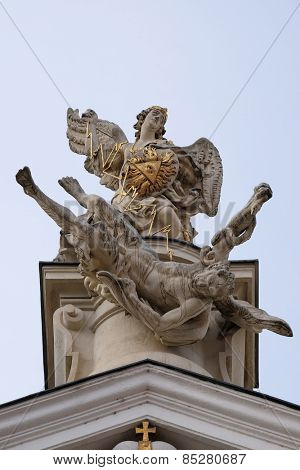 GRAZ, AUSTRIA - JANUARY 10, 2015: The Fall of the Angels, portal of Mariahilf church in Graz, Styria, Austria on January 10, 2015.