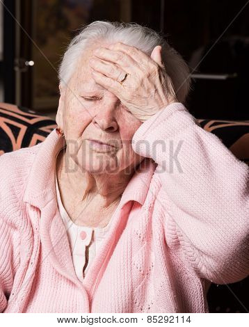 Old Woman Suffering From Headache