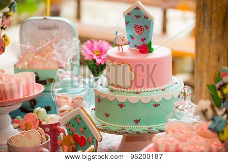 Prepared birthday table with sweets for children party