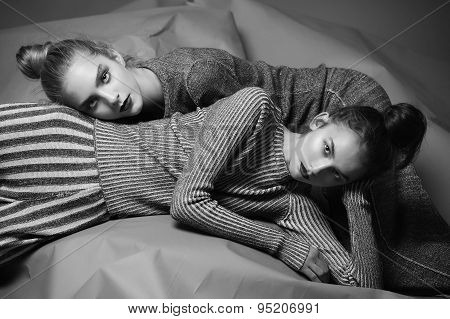 Fashion model pose on light background
