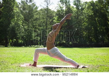 Crescent Yoga Pose In Park