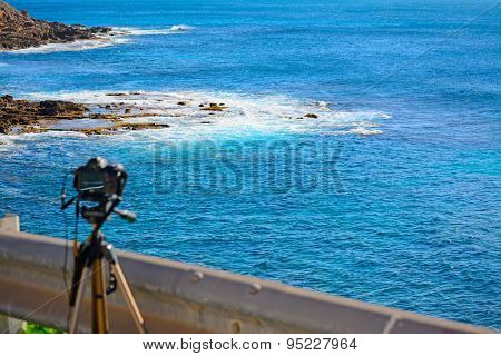 Dslr Camera On Tripod By The Sea In Alghero