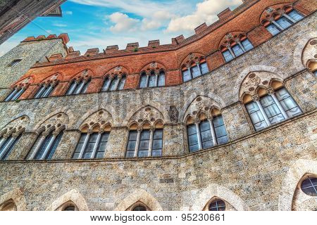 Chigi-zondadari Palace In Siena Under A Blue Sky