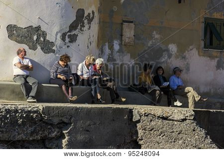 People Resting In Camogli, Italy