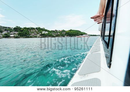 Feet On The Speedboat Across The Sea Go To Paradise Island