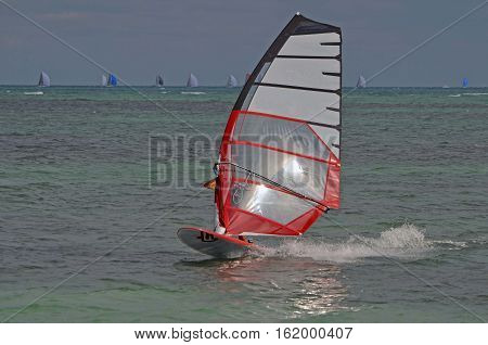 Windsurfer off of Virginia Key a popular sailboarding venue on Key Biscayne,Florida