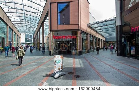 EXETER UK 11 July 2016: People in the shopping and business center of the city. Exeter