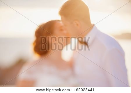 Destination Wedding Couple Kiss At Sunset