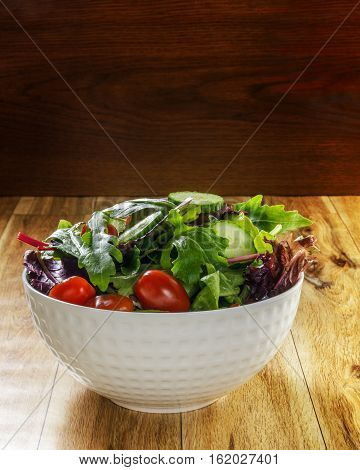 Fresh green salad mix with spinach aragula tomatos cucumber