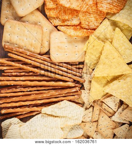 Heap Of Salted Crisps, Breadsticks And Cookies, Concept Of Unhealthy Food