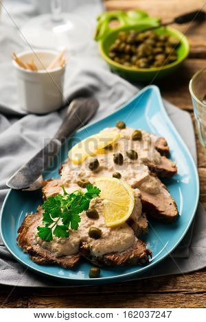 Vitello tonnato . selective focus. style rustic