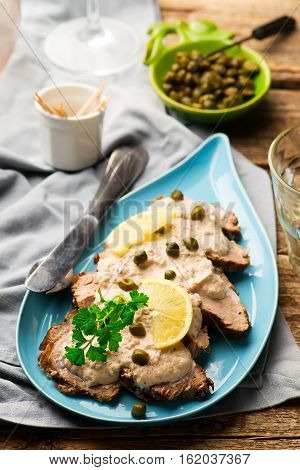 Vitello tonnato . selective focus. style rustic