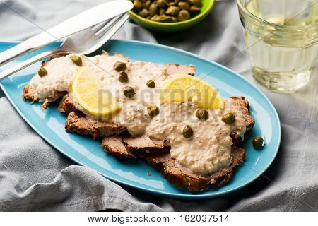 Vitello tonnato . selective focus. style rustic