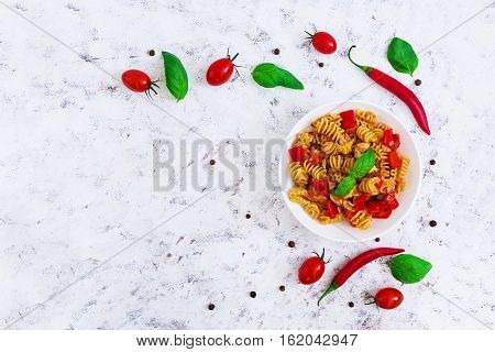 Radiatori Pasta With Chicken And Peppers On White Background. Top View