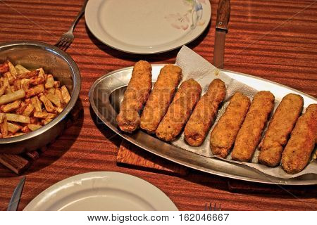 Fried stuffed Karadjordje schnitzel on a table