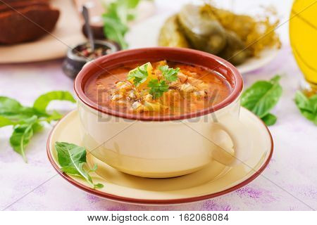 Soup With Pickled Cucumbers And Pearl Barley - Rassolnik On A Light Background.