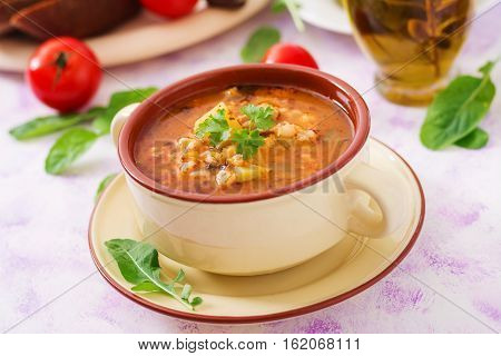Soup With Pickled Cucumbers And Pearl Barley - Rassolnik On A Light Background.
