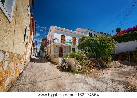 The Island of Paxos, Greece, 22 May, 2016: Short summer walk along the narrow streets of the Island of Paxos.