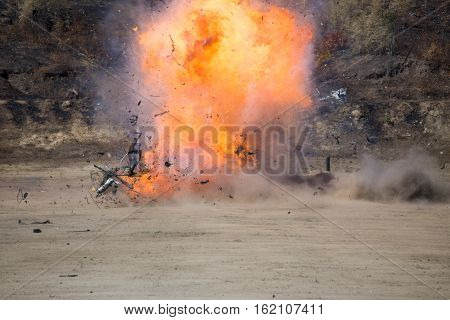 fire and movement of car part blown away from explosion in post blast investigation course training