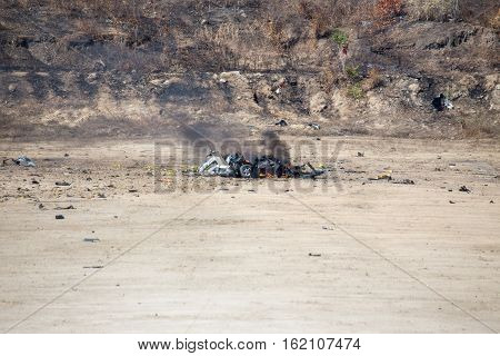 fire and movement of car part blown away from explosion in post blast investigation course training