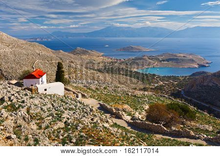 Church on a hilside on Halki island in Dodecanese archipelago, Greece.