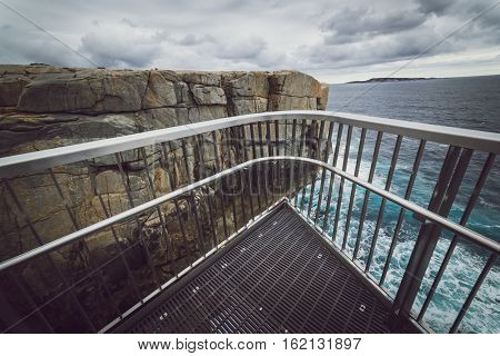 Scene view of Torndirrup National Park Natural Bridge in The Great Southern - Albany Western Australia. vintage toning filter add .