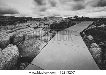 Footpath to the Gap a stone formation in Torndirrup National Park Albany Western Australia. Black and White toning filter add .