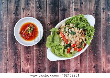 Stir - Fried Spicy Basil With Crad And Spicy Sauce.