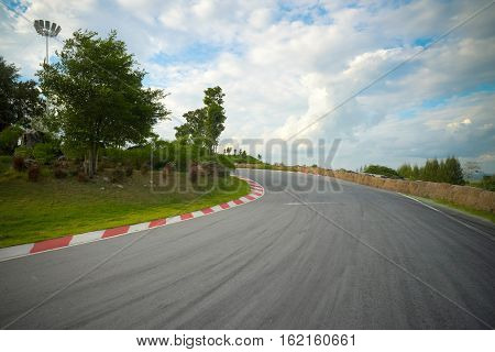 racetrack straight to the mountain with the clear sky.