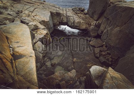 Torndirrup National Park Natural Bridge in The Great Southern - Albany Western Australia. vintage toning filter add .