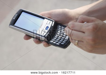 Textilie s PDA telefon