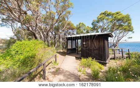 visitor information small wooden house on Coalmine Beach Walpole Australia .