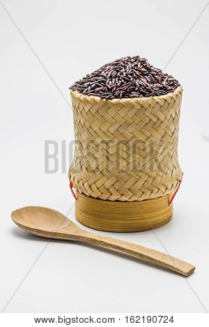 Riceberry rice in the kratip rice on white background.