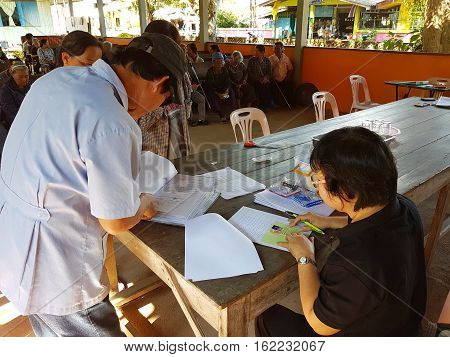 CHIANG RAI THAILAND - DECEMBER 19 : Unidentified asian doctors diagnose people suffering from leprosy on December 19 2016 in Chiang rai Thailand.