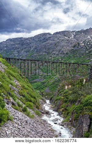 Abandoned railroad bridge in the Klondike in Alaska