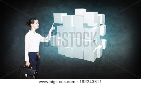 Businessman hand put together small cubes into big. Problem solving concept