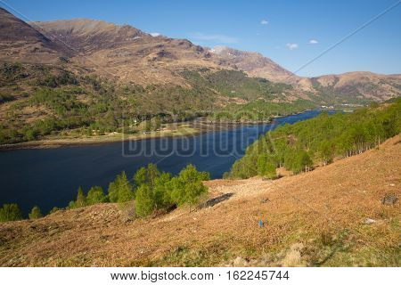Beautiful Scottish Loch Leven Scotland UK in summer with mountains sunshine and blue sky