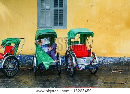 Cyclo (rickshaw) On Street In Hoi An, Vietnam