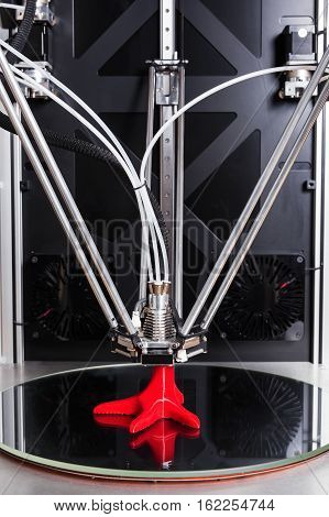 Vertical picture of 3 D printer after printing
