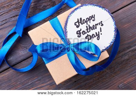 Father's Day card and gift. Greeting card and ribbon bow. Handmade greeting for dad.