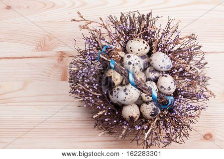 Quail eggs on the board. Copy spase. Nature background