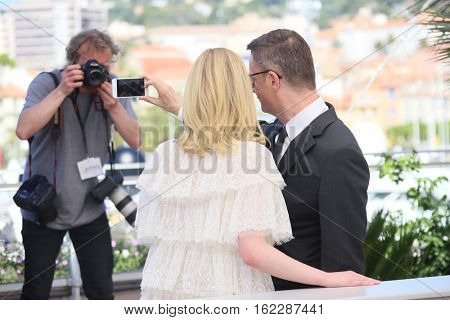 Nicolas Winding Refn, Elle Fanning attends the 'The Neon Demon' photocall during the 69th annual Cannes Film Festival at Palais des Festivals on May 20, 2016 in Cannes, France.