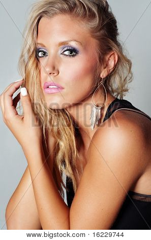 Fashion and beauty head and shoulder photo of beautiful blond woman