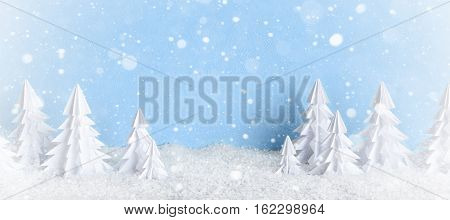 Winter Christmas Minimalist Background Frosty Baner With White Paper Trees On Blue .