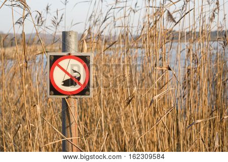 Fishing Forbidden Sign By A Lake