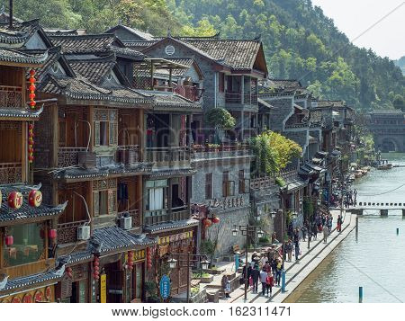 April 13 2015. A view of stone and wooden buildings of Phoenix Ancient Town Fenghuang Zhangjiajie China.