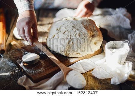 Close Up View Of Baker Kneading Dough. Homemade Bread. Hands Pre
