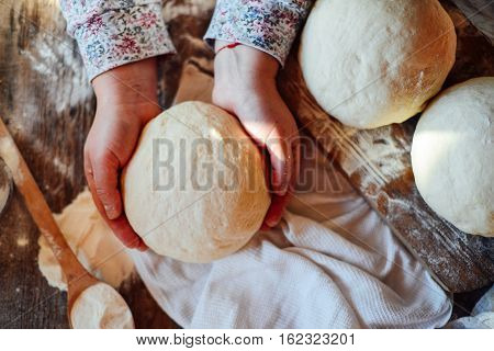 Close Up View Of Baker Kneading Dough. Homemade Bread. Hands Pre